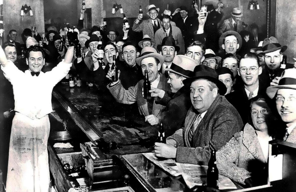 prohibition era image of people celebrating the end of prohibition in a bar